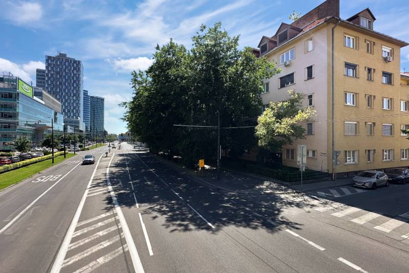 Roads and buildings on Karadžičova Street in Bratislava - Staré Mesto, surrounded by greenery.