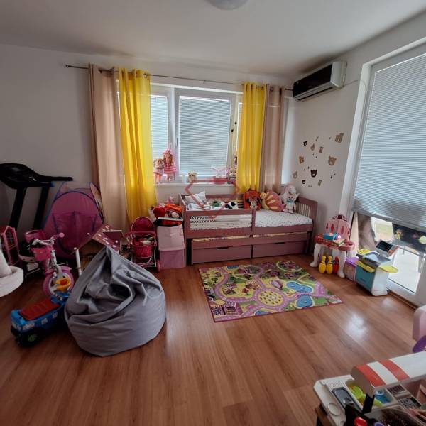 A children's room full of toys and colorful decorations in a 3-room apartment.