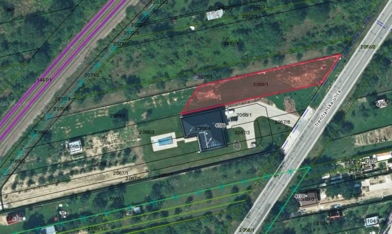 Aerial view of residential plots in Nové Mesto nad Váhom, by the road.