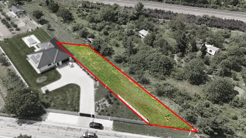 Lands - housing in Nové Mesto nad Váhom, highlighted with a red border, next to the railway.