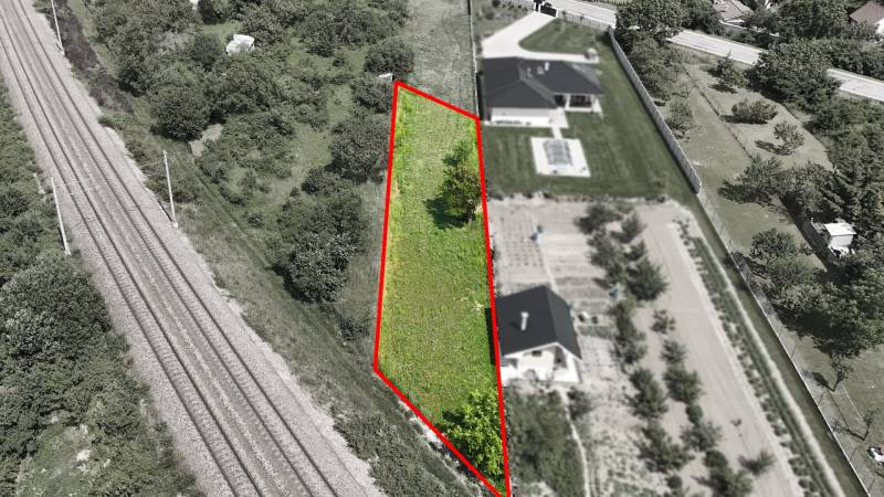 Aerial view of residential land in Nové Mesto nad Váhom near the railway.