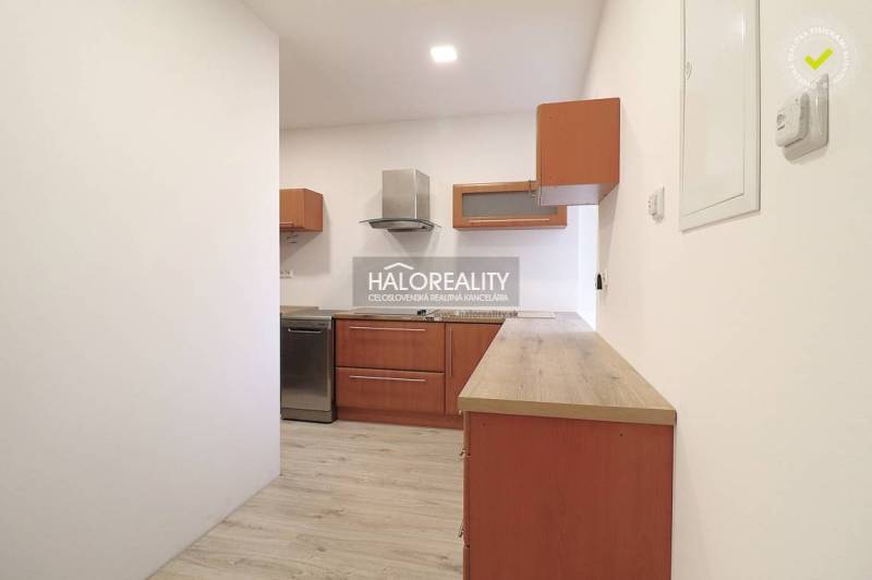Kitchen unit, kitchen, family house, wooden cabinets, white walls, floor, extractor hood.