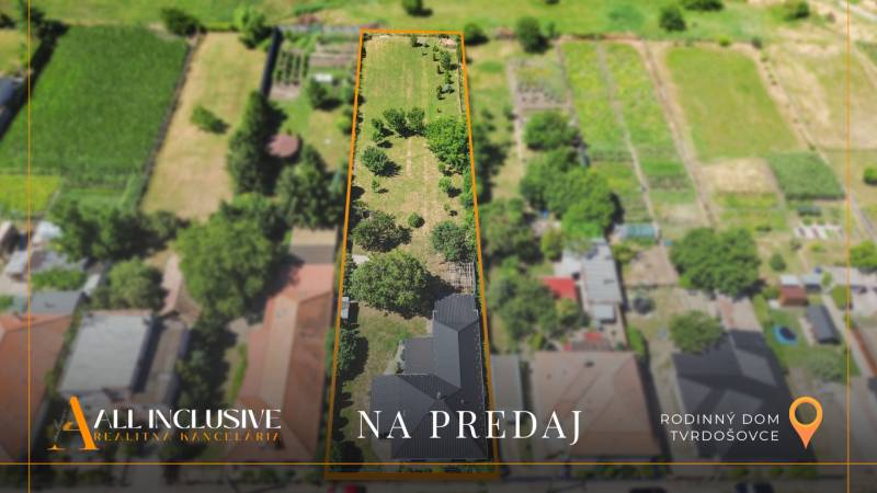 Aerial view of a land sale with a family house in Tvrdošovce, set in greenery.