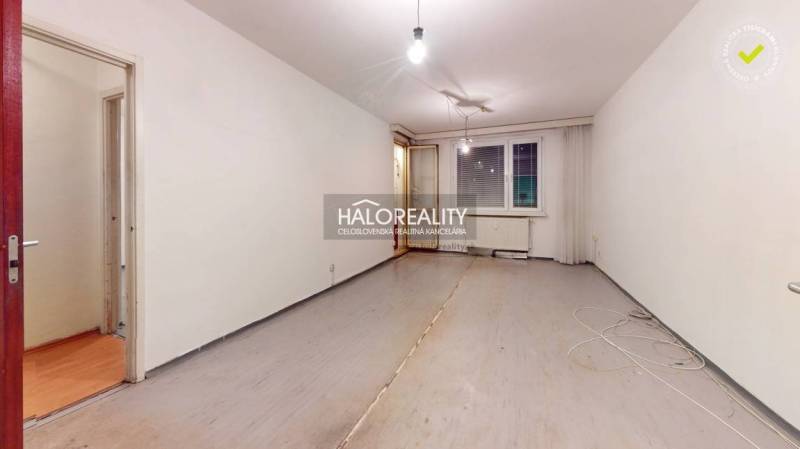 An empty room and a 3-room apartment with light walls and exposed floorboards.