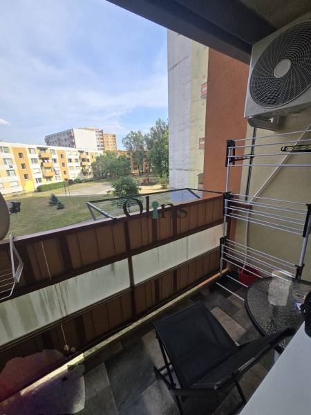 Balcony of a 2-room apartment on Sitnianska Street, Nitra - Chrenová, with a view of the apartment blocks.