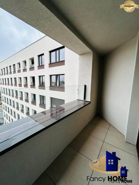 Balcony on Karpatská Street in Poprad at a 1-room apartment with a view.