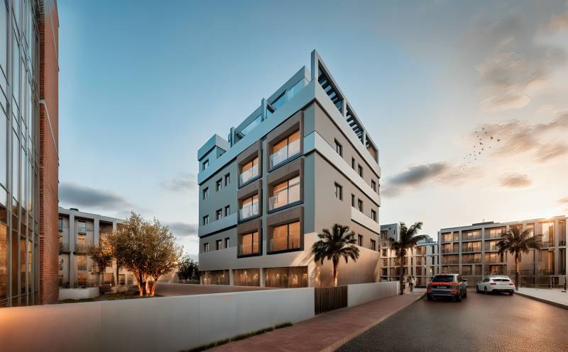 Streets in San Pedro del Pinatar with modern buildings and greenery in front of 3-bedroom apartments.