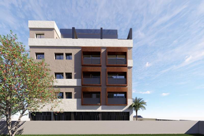 A building in San Pedro del Pinatar with balconies and greenery in front of a 3-room apartment.