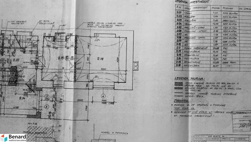 Floor plan of office space in a building with room details and materials.