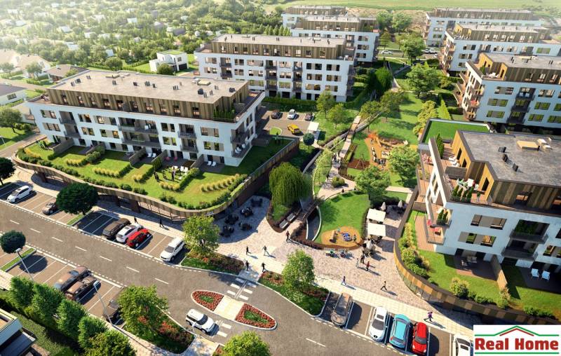 A view of modern residential complexes in Senec on Vtáčia Street with surrounding dining spaces.
