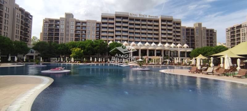 The exterior of a holiday apartment on the Sunny Beach with an interesting pool area.