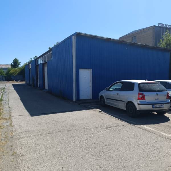 Blue building on Textilná Street in Košice - Nad jazerom district, warehouses and halls.