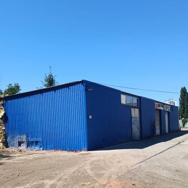 Blue metal warehouse on Textilná Street in Košice - Nad jazerom district.