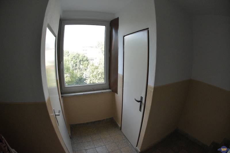 Stairwell with a window and doors in an apartment building in Bratislava - Petržalka.