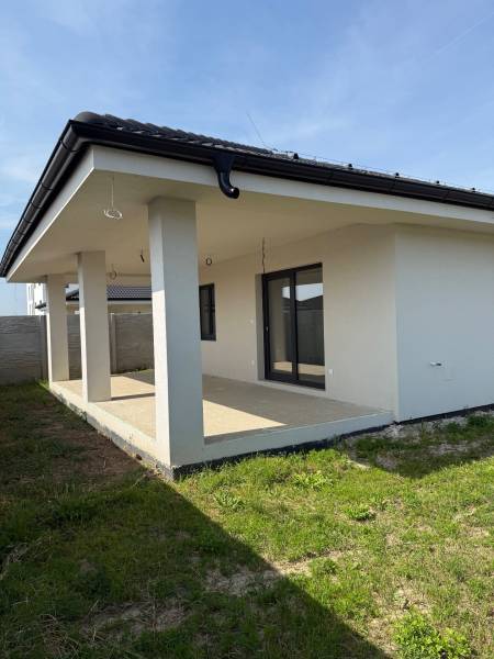 A family house in Galanta Košúty with a terrace and a grassy plot.