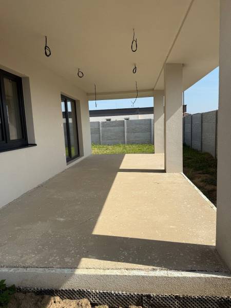 The terrace of a family house in Galanta Košúty with a concrete floor and wire preparations.