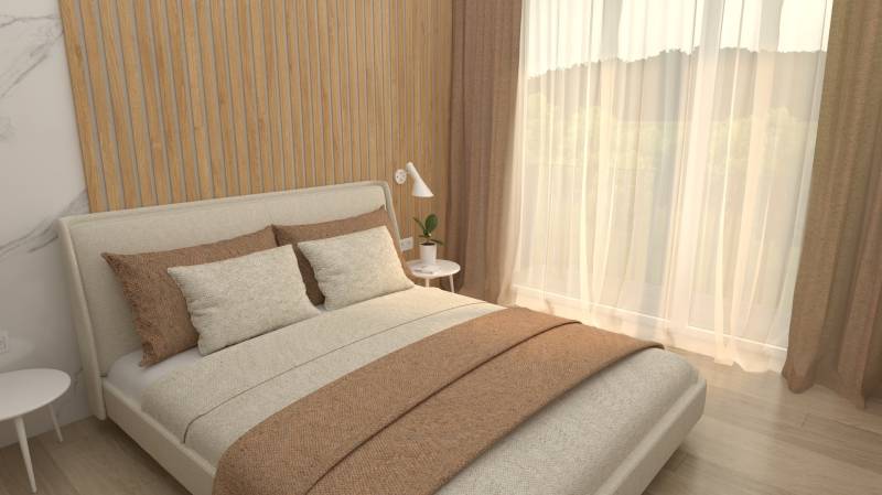 Bedroom in a 2-room apartment with wooden paneling and a large window.