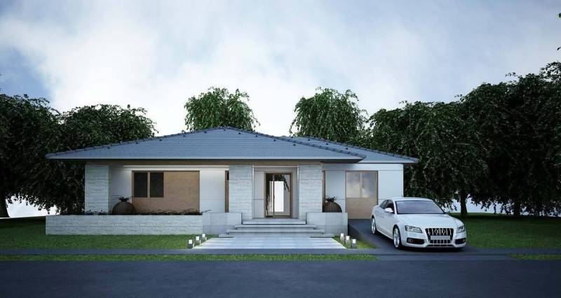 A family house in Western Slovakia with an entrance hall and spacious parking, surrounded by greenery.