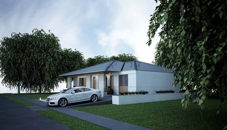 A family house in Western Slovakia with a white car in the driveway.