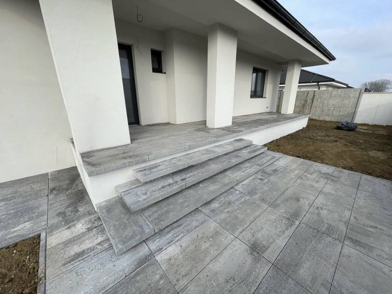 Entrance steps and terrace of a family house in Western Slovakia with new paving.