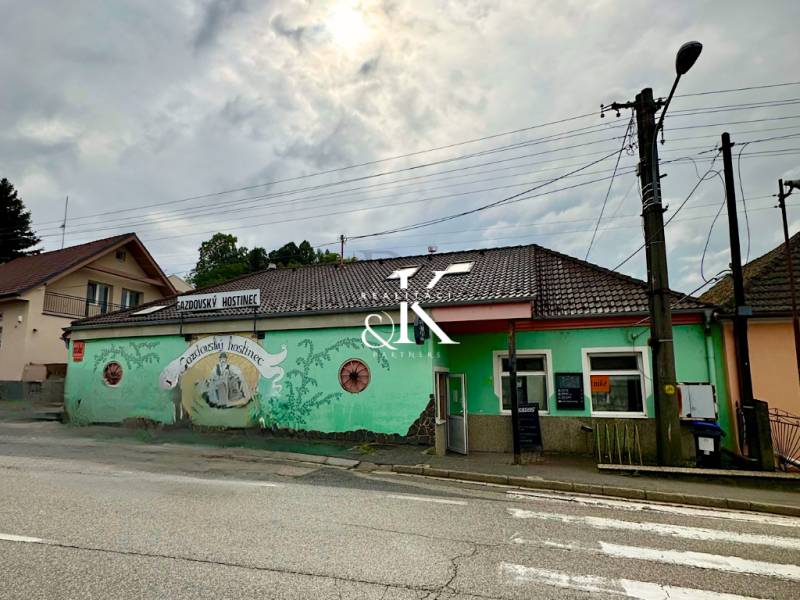 Gazdovský hostinec in Moravany nad Váhom with a colorful facade and traditional gastro spaces.