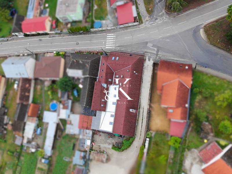 Aerial view of streets and buildings in Moravany nad Váhom, including dining spaces.