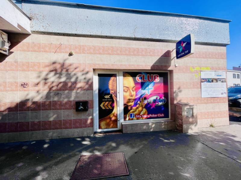 Club commercial premises on Ármin Vámbéry Square in Dunajská Streda with a colorful display.