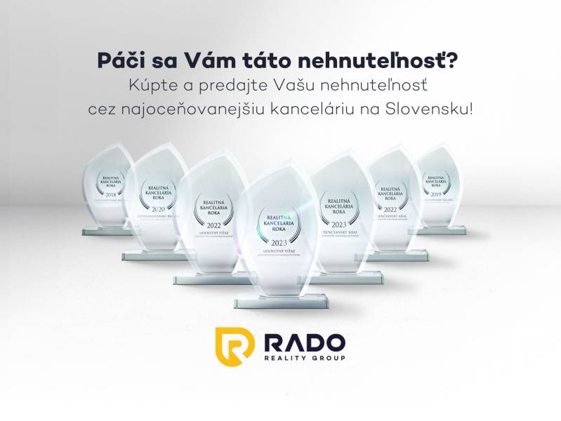 Awards for the real estate agency RADO Reality with a text about property sales.