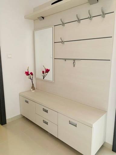 Light furniture, mirror, and drawers in a 2-room apartment on Palisády Street.