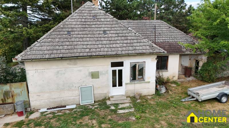 A family house in Kolárovo with a traditional tiled roof and a simple exterior.