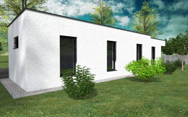 A family house in Western Slovakia with a garden and a simple white facade. Construction of houses.