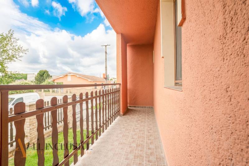 Balcony in hotels and guesthouses in Veľký Meder with a view of the surrounding architecture.