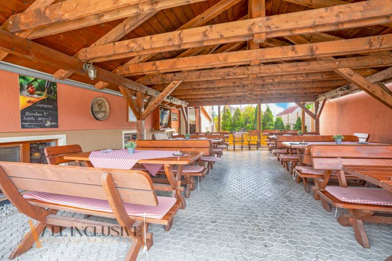 Wooden gazebo with benches and tables in hotels and guesthouses in Veľký Meder.