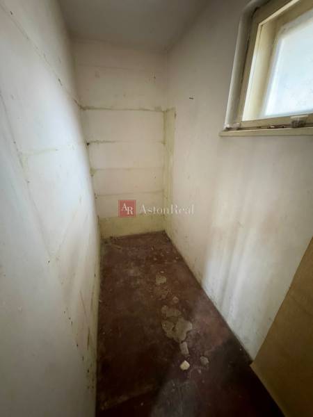 A small room with light from the window, ideal for storage, on Lietavská Lúčka street.
