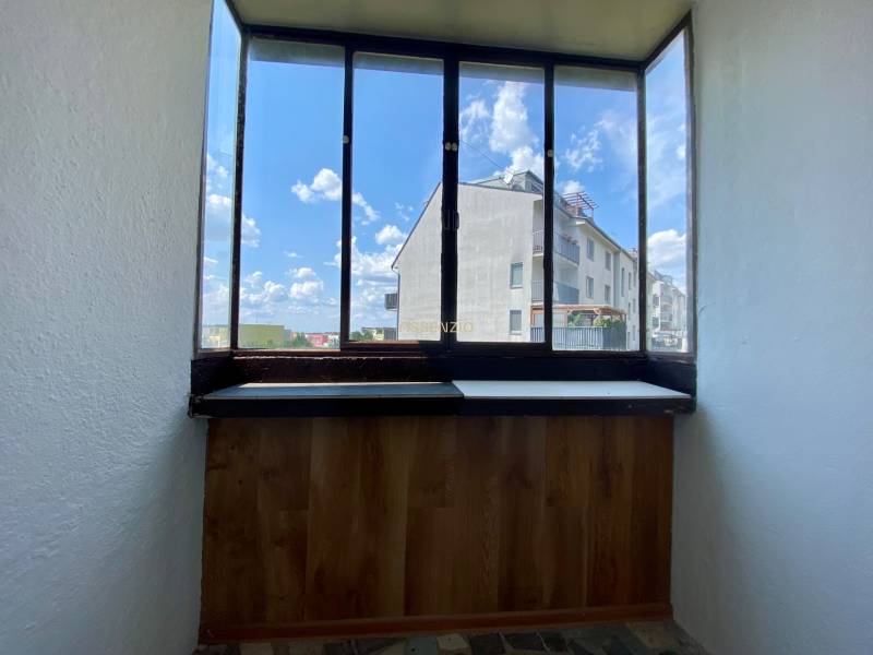 The 3-room apartment has a glazed loggia with a view of the housing estate.