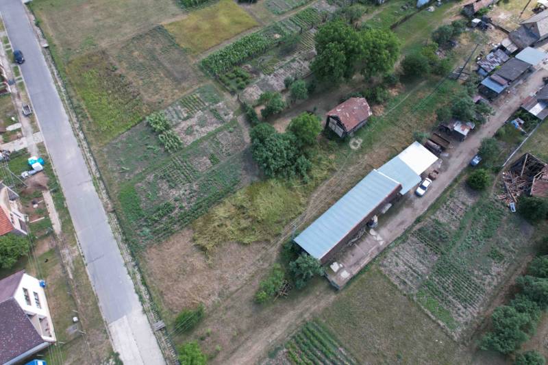 Agricultural landscape and houses by the road in Štrkove, Construction of houses.