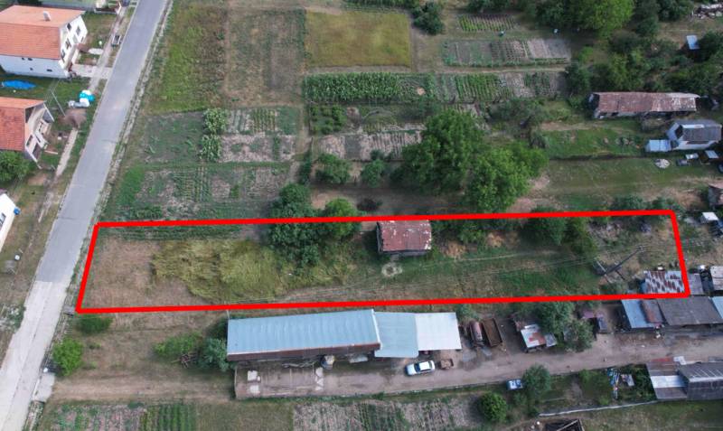 Land marked by a red line in the area of House Construction, Štrkovec.