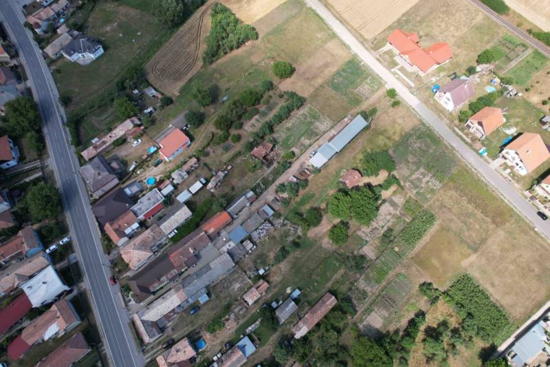 Aerial view of house construction in Štrkovec with surrounding fields and roads.