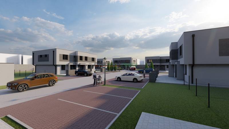 A street with new houses on Triblavinska in Chorvátsky Grob, parking and people outdoors.