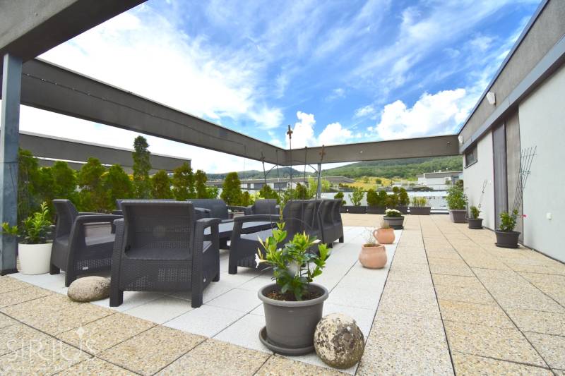 Terrace space with furniture and plants, Pri vinohradoch in Bratislava - Rača, 4-room apartment.