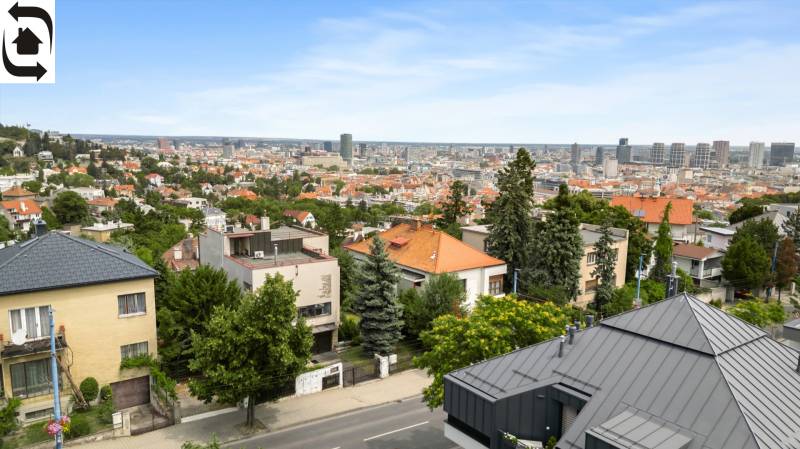 View of Bratislava - Old Town from Mudroňova Street, surrounded by family houses and greenery.