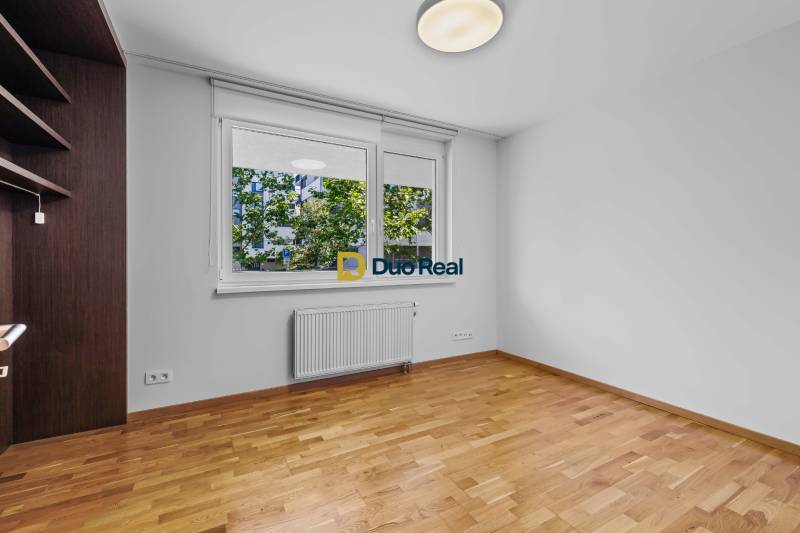 A room with a wooden floor and a window, 3-room apartment.
