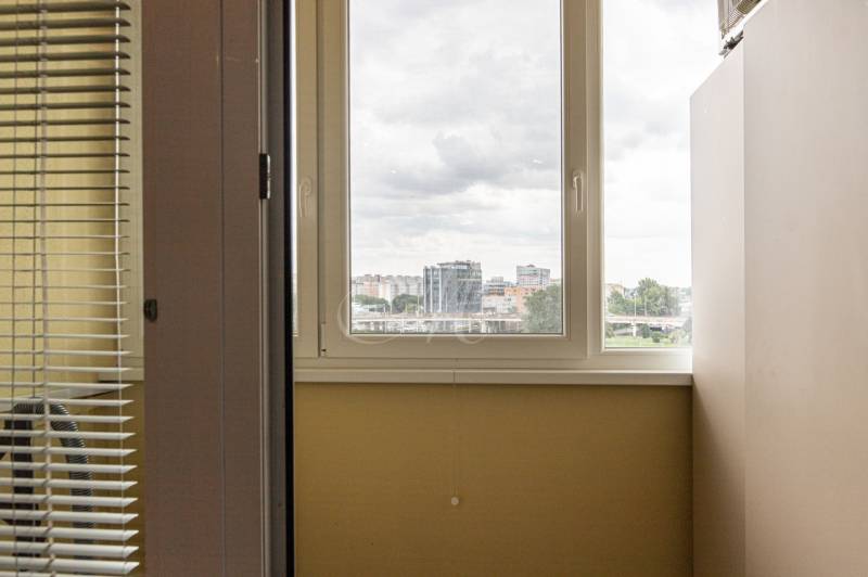 View from a 3-room apartment with a window and blinds in Bratislava - Petržalka on Gercenova Street.