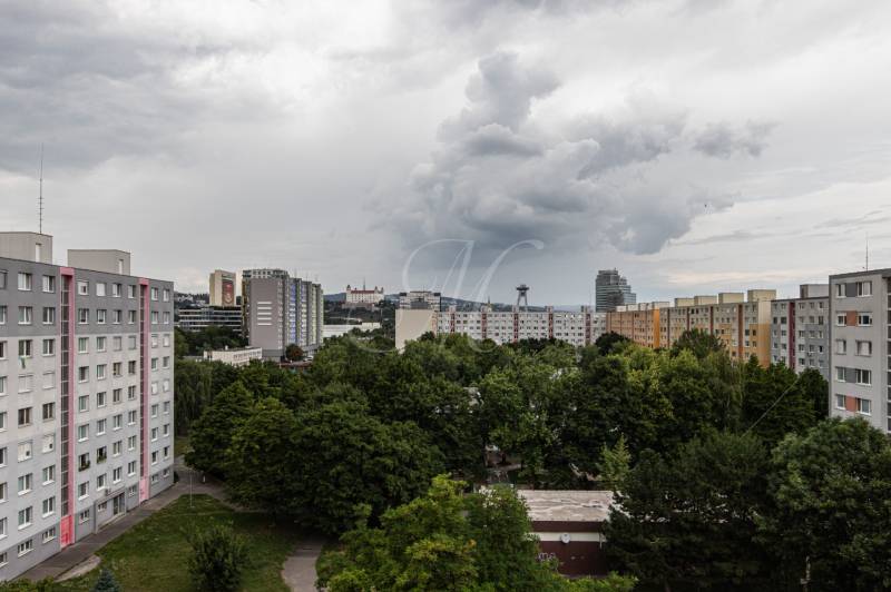 View from a 3-room apartment on Gercenova Street in Bratislava - Petržalka, clouds over the city.
