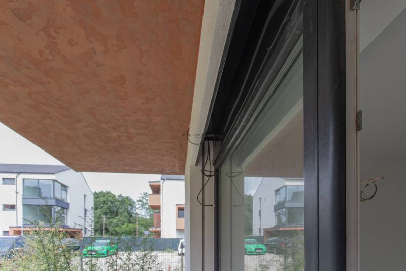 View from the balcony of a 2-room apartment overlooking Javorová Street in Kostolište.
