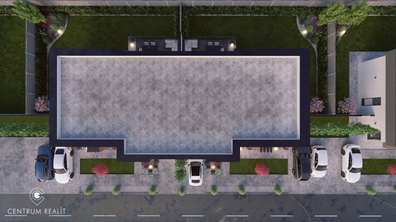A top view of the garages and garden of a family house on Vrakúň Street in Dunajská Streda.