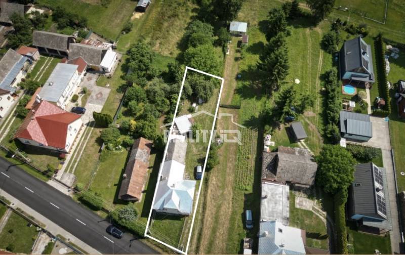 Aerial view of the garden and surroundings of a family house in the town of Konská.