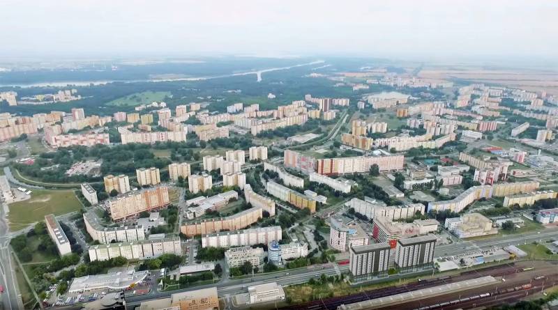 Construction of apartments in Bratislava - Petržalka on Panónska Street with a panorama of residential blocks.