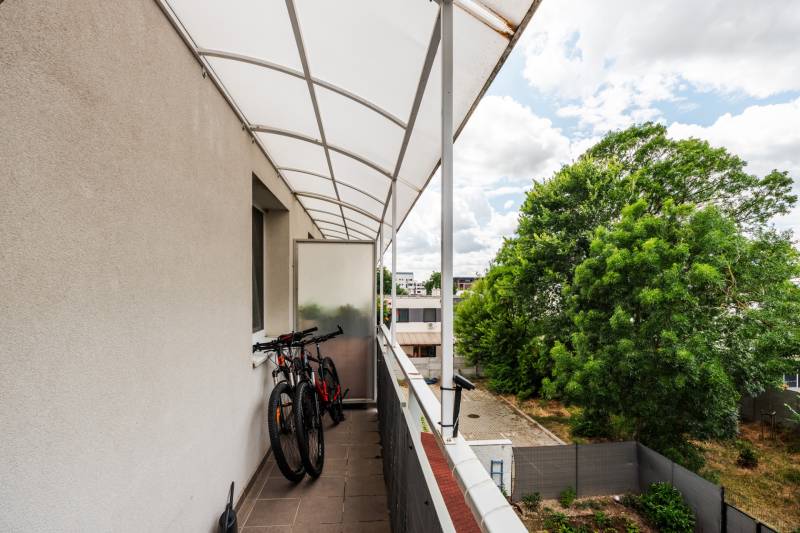 A balcony with bicycles in a 2-room apartment on Agátová Street in Rovinka.