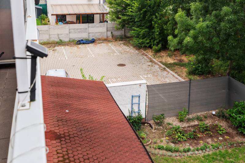 View of the parking lot from the roof of a 2-room apartment on Agátová Street, Rovinka.